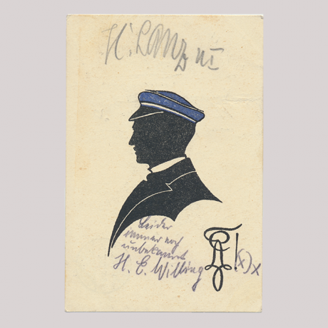 
        Front of silhouette, with man looking left, wearing a hat.